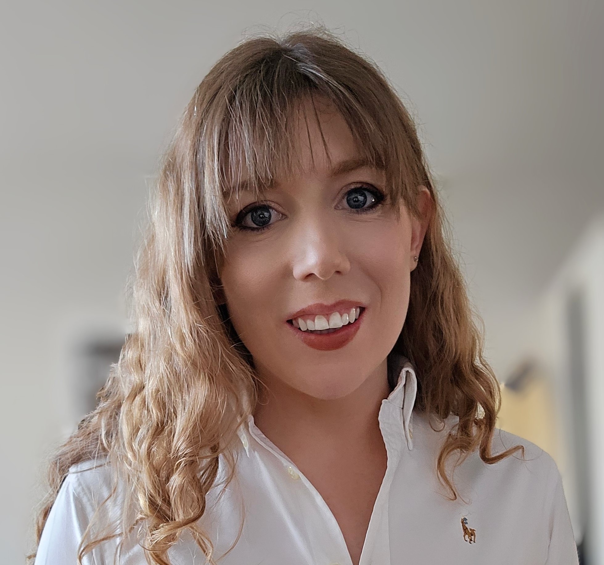 Olivia Brechney , Associate Director